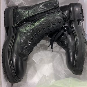 Lightly used combat boot. Authentic Jimmy Choo Cora. Size 37.